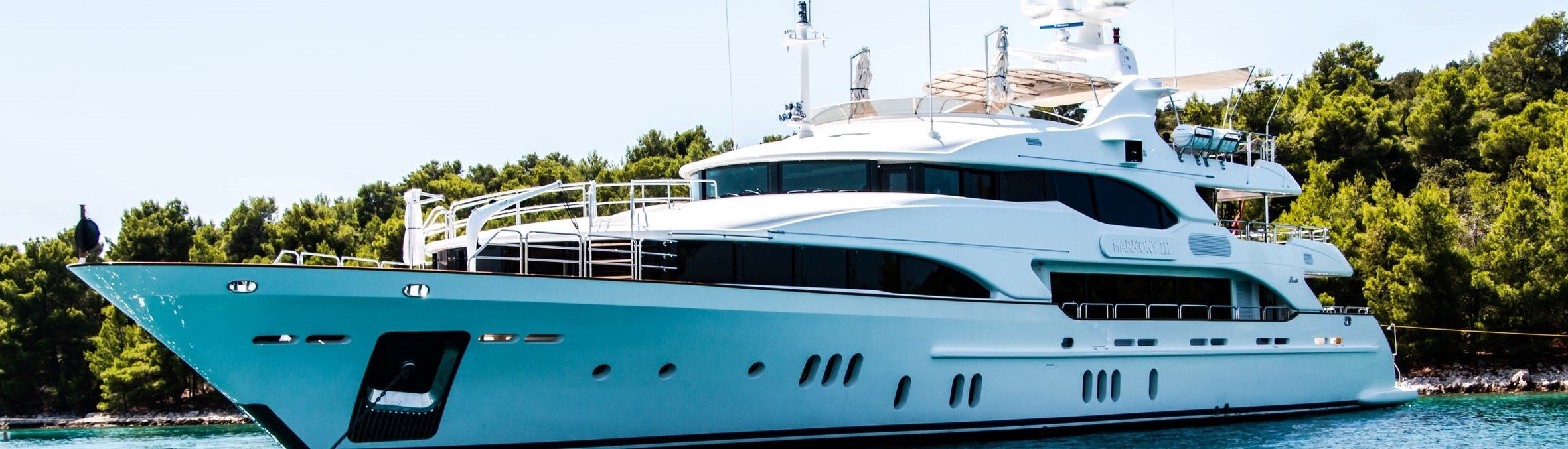 a photo of a large, fancy yacht anchored after yacht delivery.